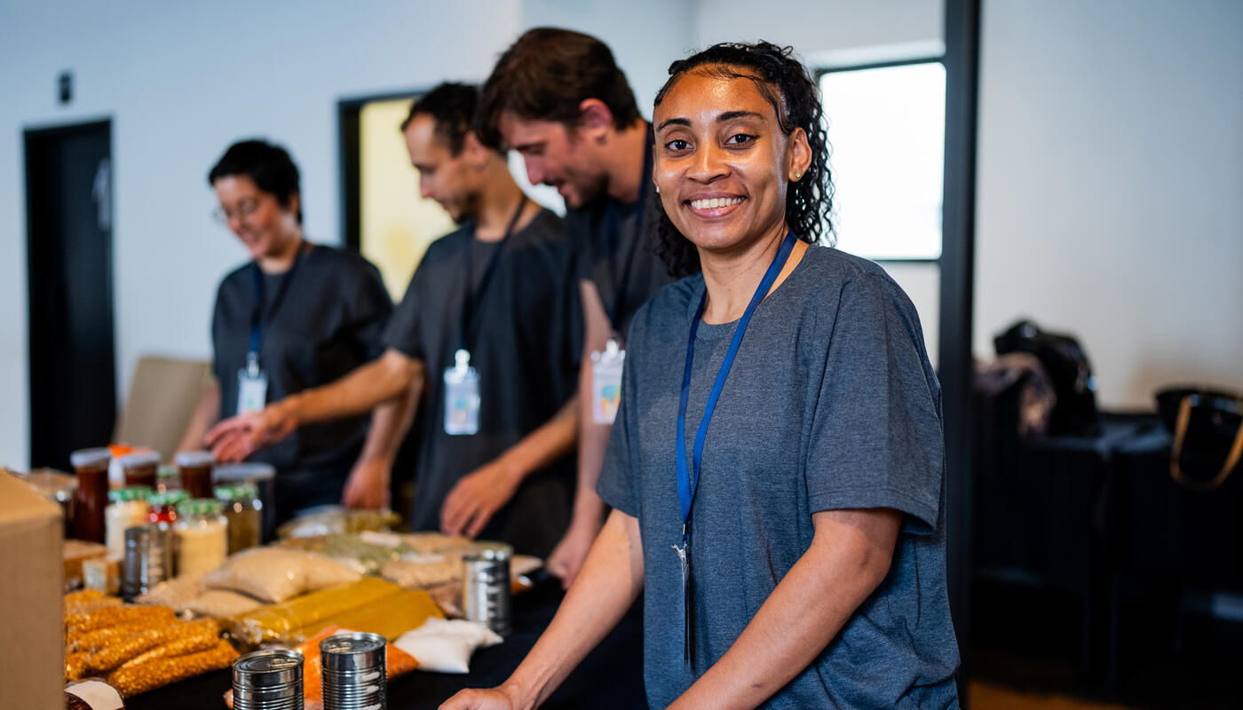 Volunteers sorting donations at a food bank